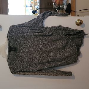 Lightweight sweater.  Elastic pull on one side.  Cute with leggings